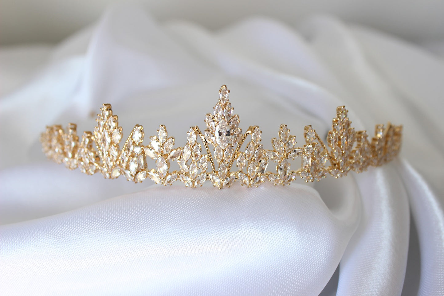 Gold bridal crown on white background
