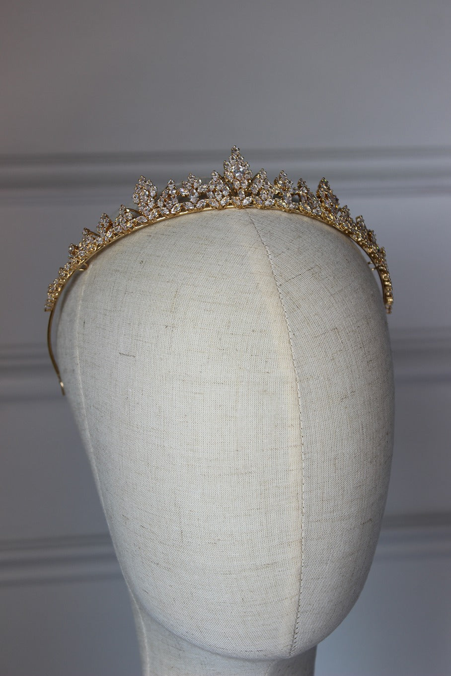 Gold bridal crown on mannequin