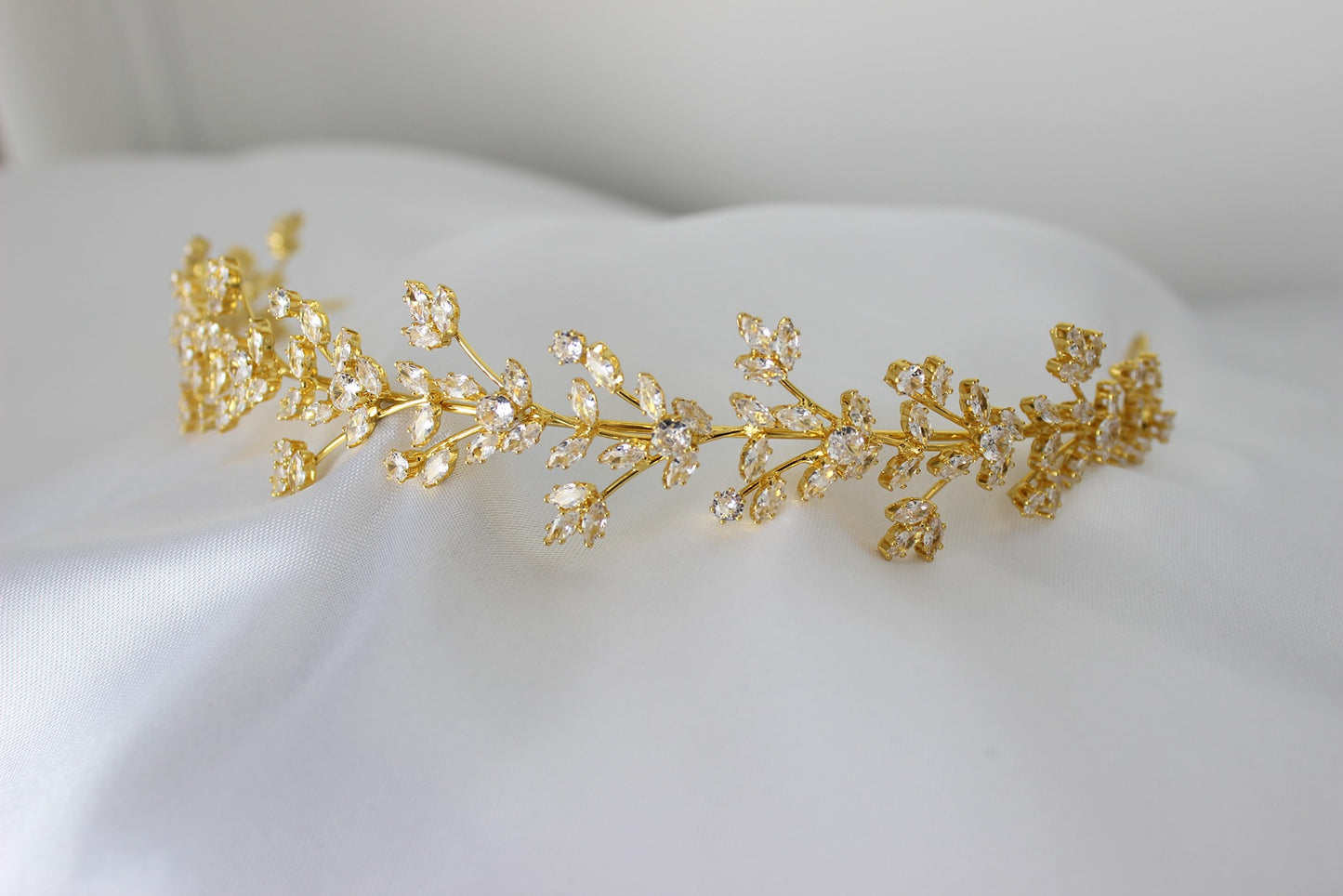 Gold headpiece on white background