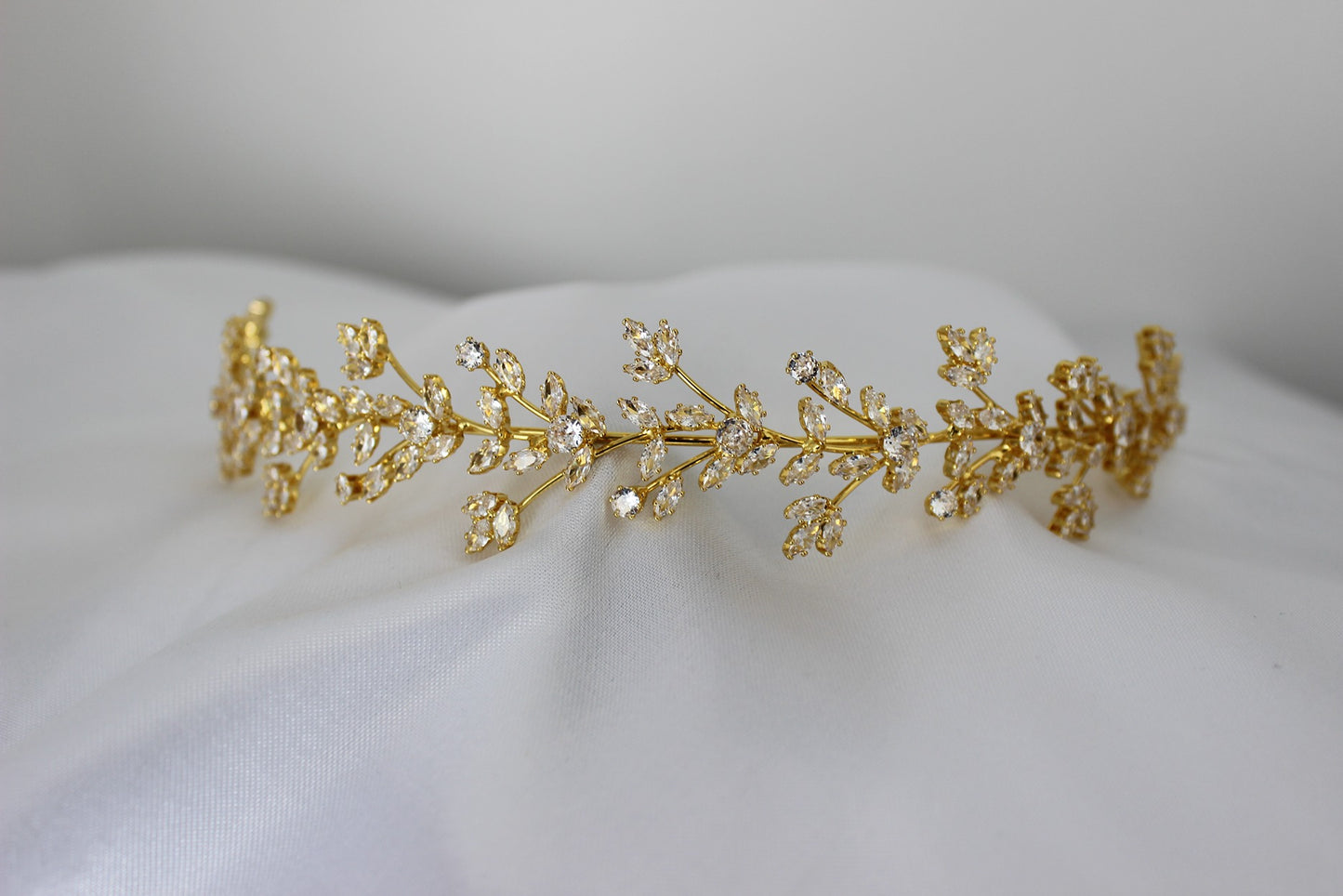 Gold headpiece on white background