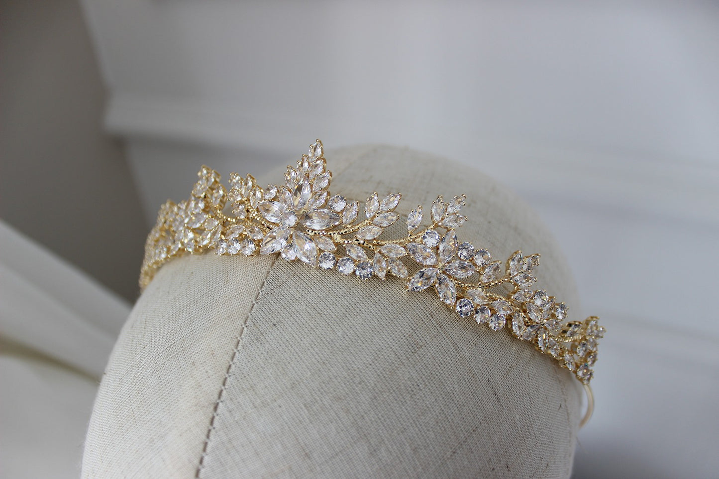 gold tiara on mannequin