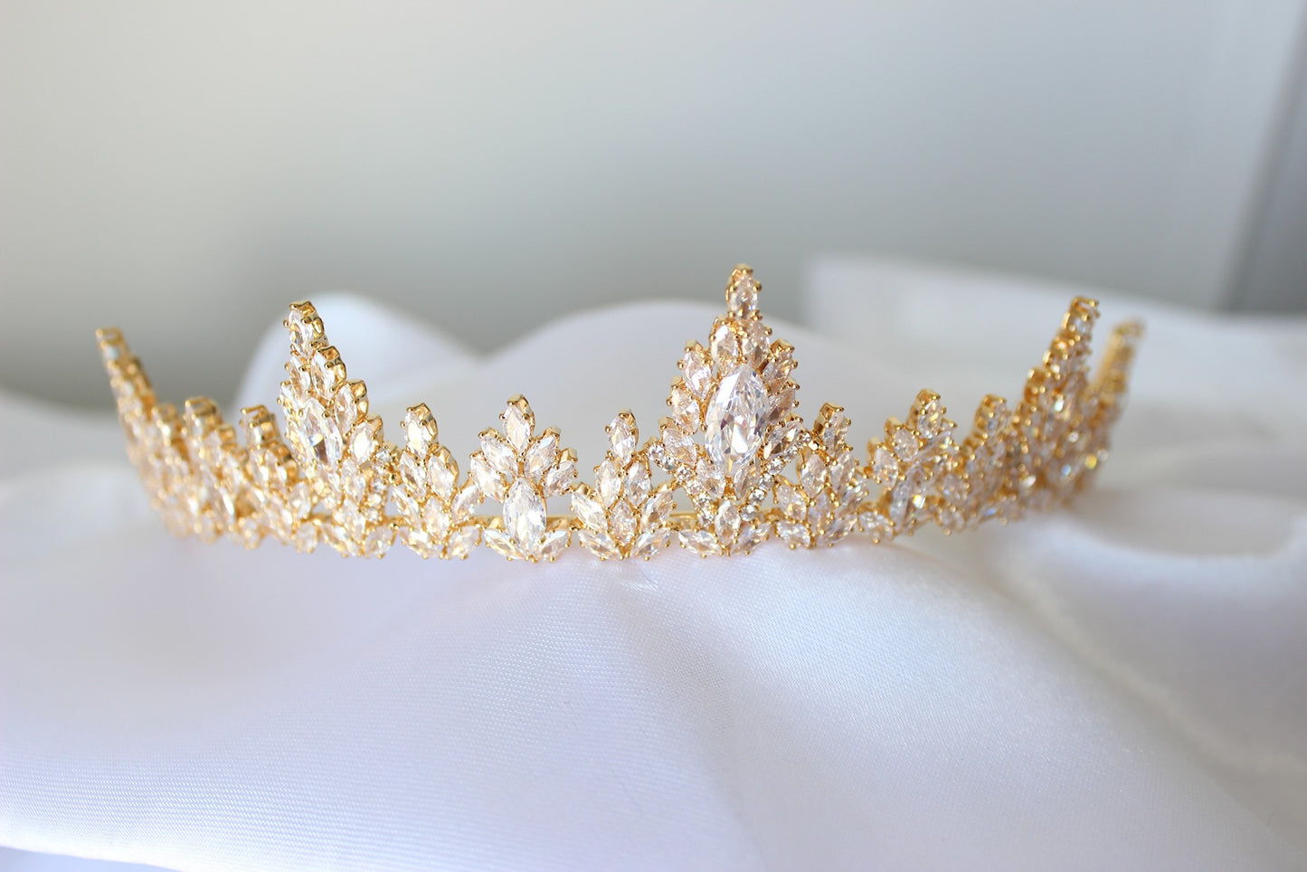 Gold bridal tiara on white background