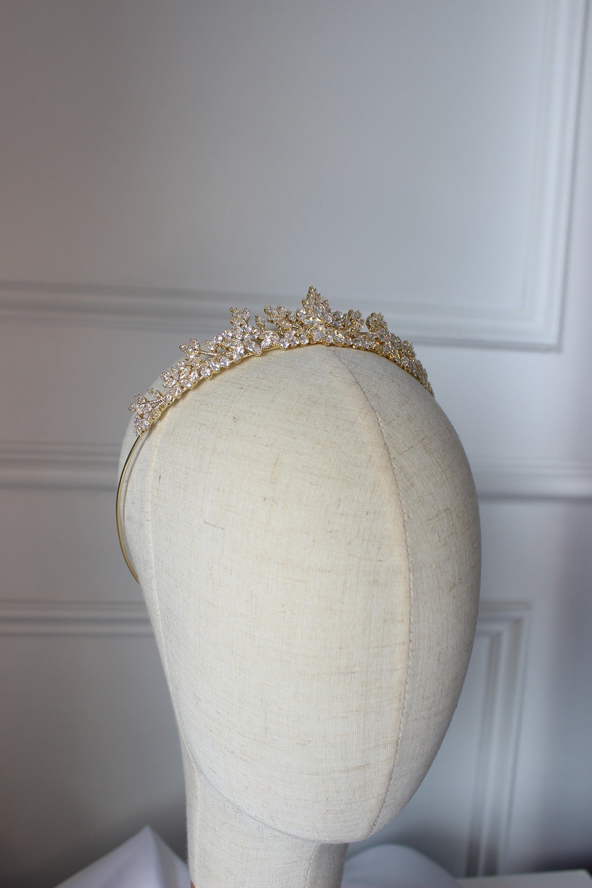 gold tiara on mannequin