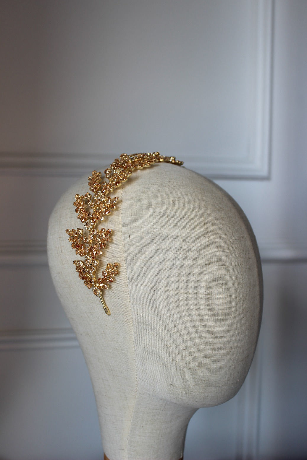 Gold headpiece on mannequin