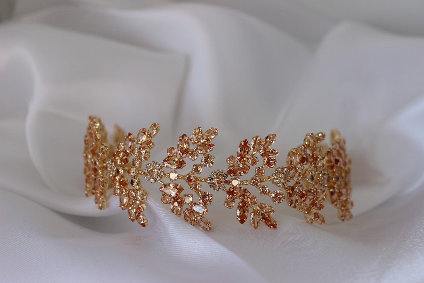 Gold headpiece on white background