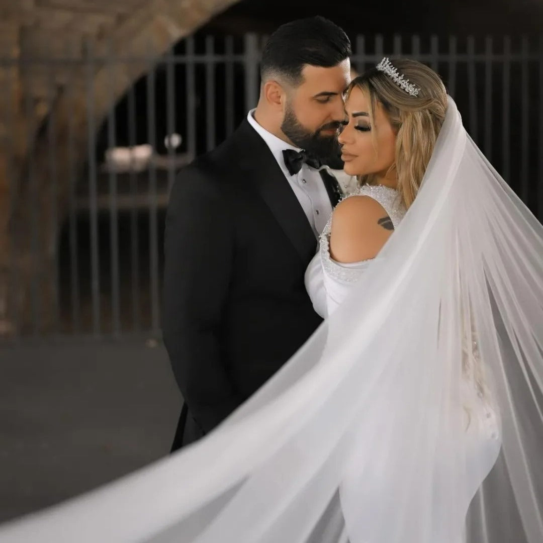 Bride wearing silver bridal tiara and wedding veil