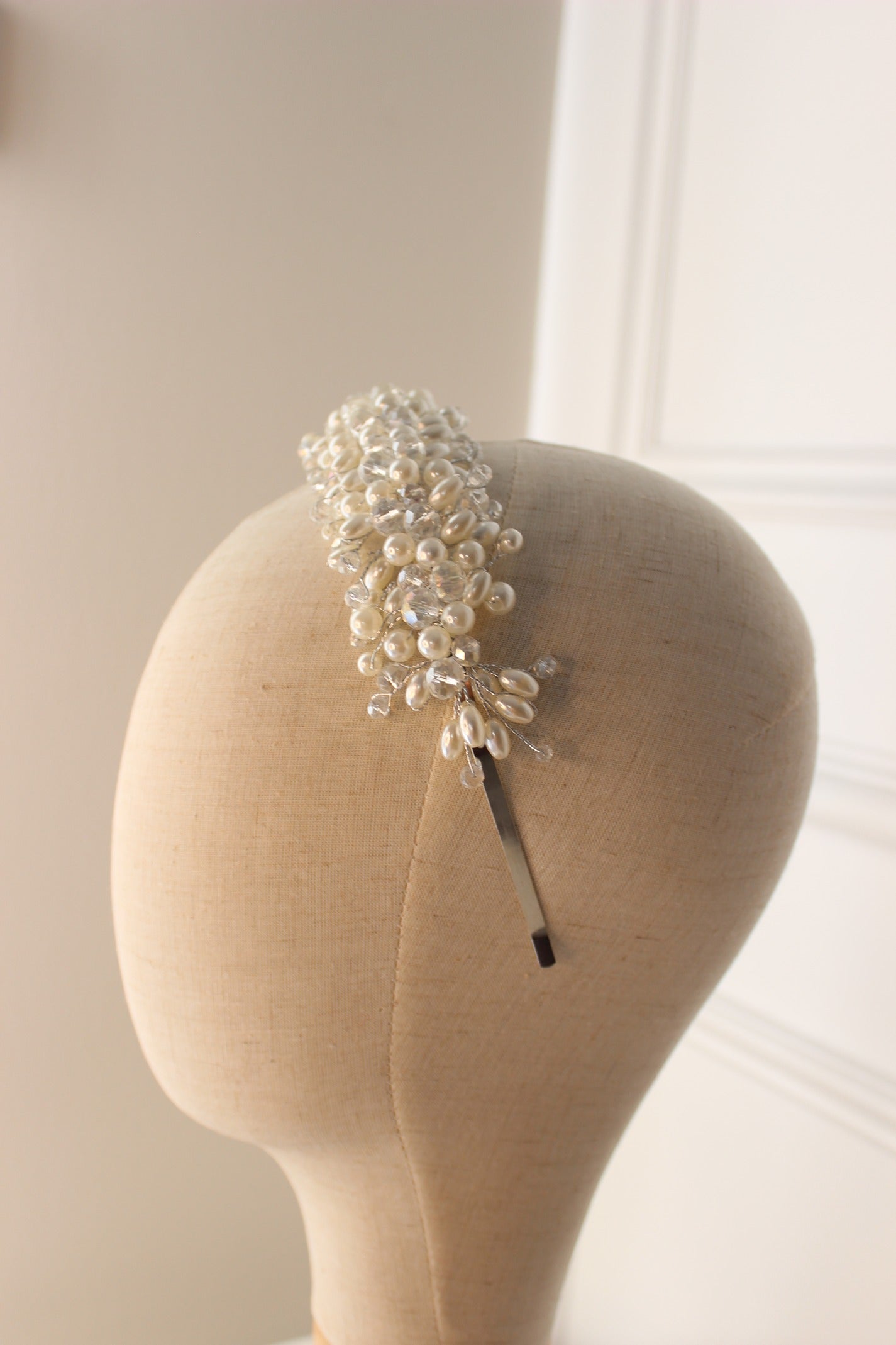 Pearl bridal headband on mannequin