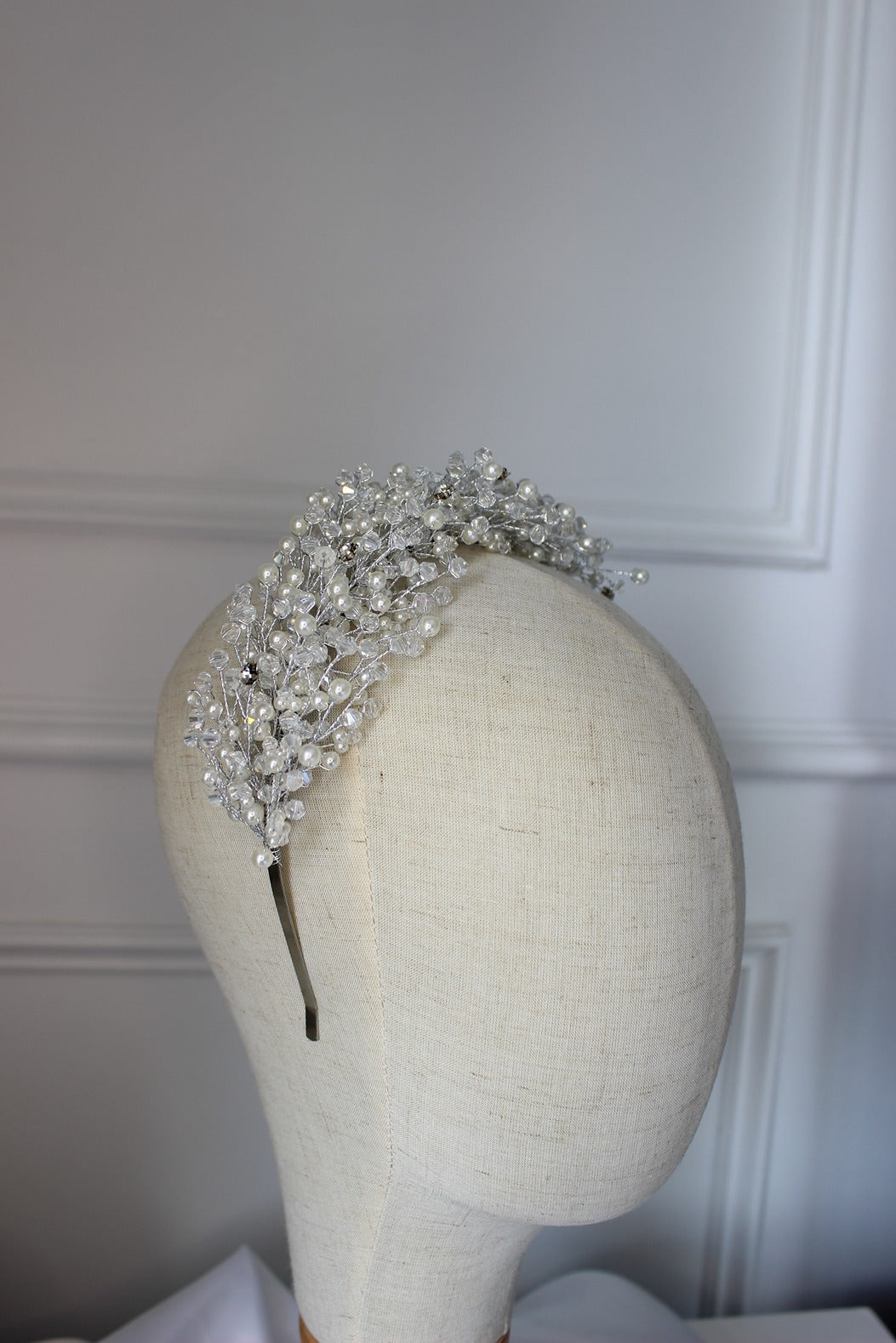 Pearl bridal headband on mannequin