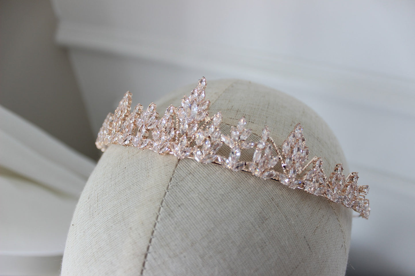 Rose gold bridal tiara on mannequin