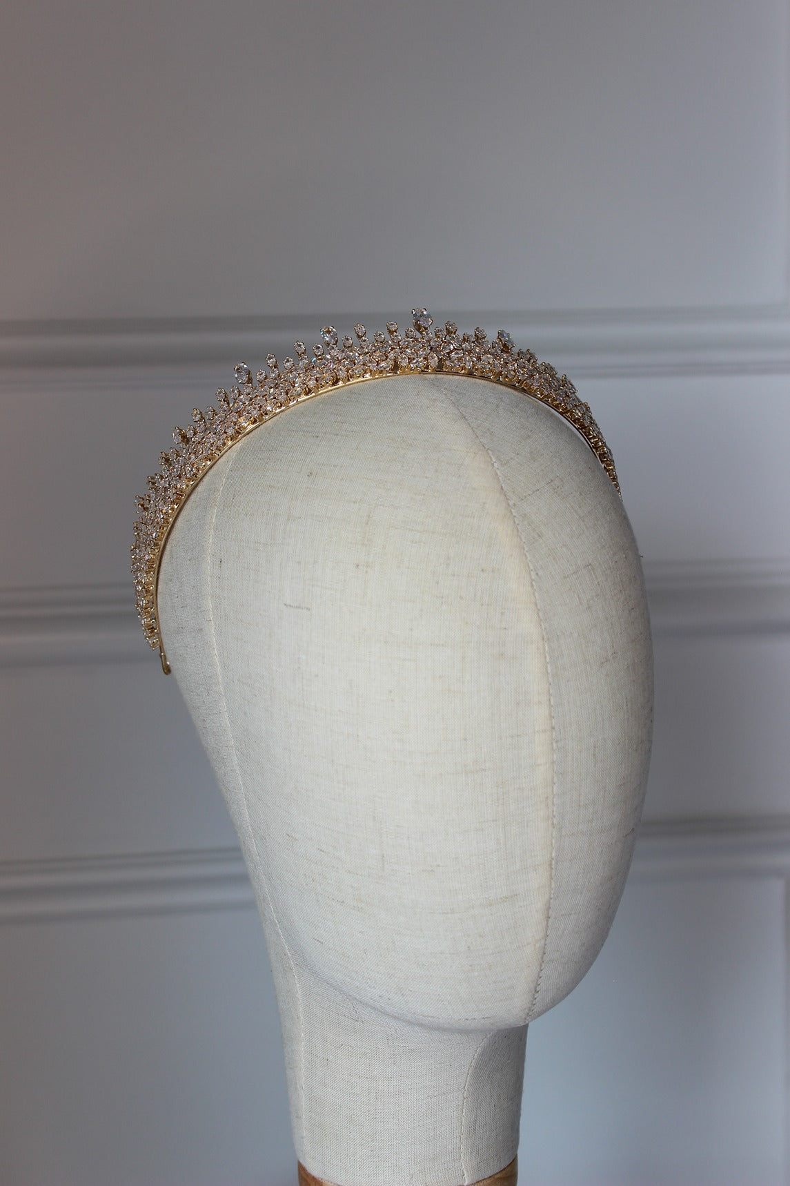 Rose gold bridal crown on mannequin