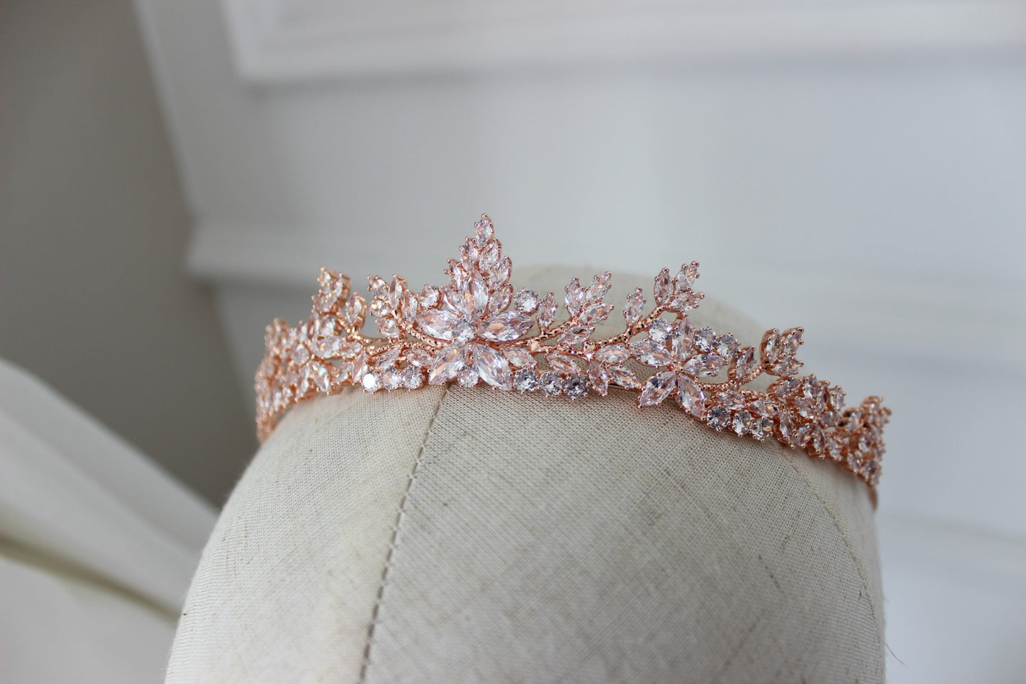 Rose gold bridal tiara on mannequin