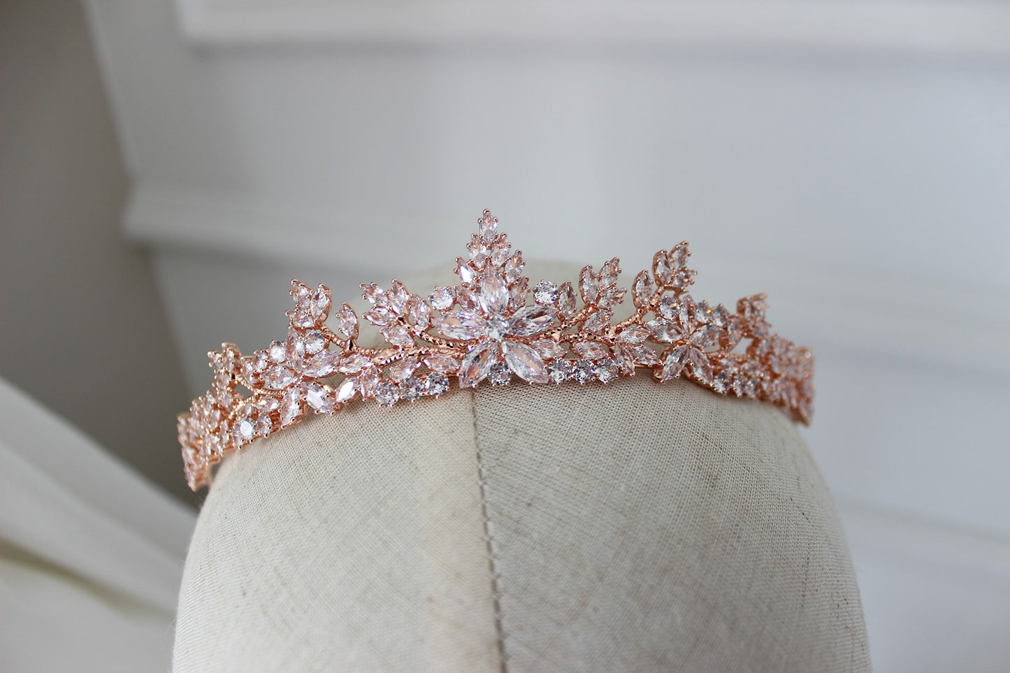 Rose gold bridal tiara on mannequin