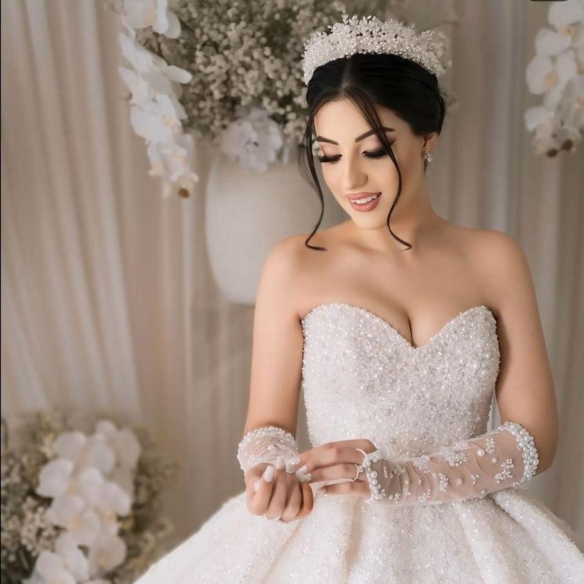 Bride wearing pearl silver bridal crown