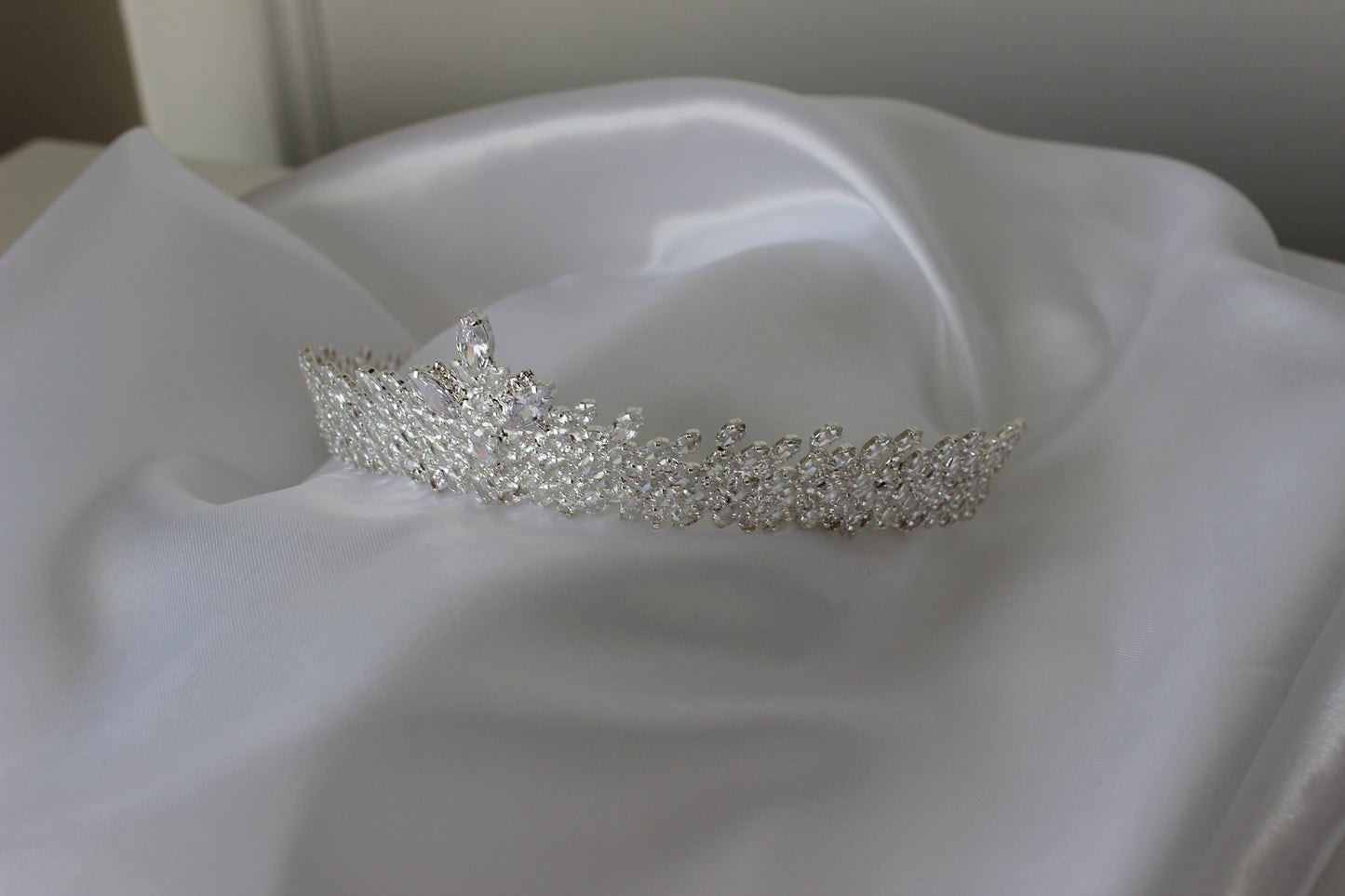silver bridal crown on white background