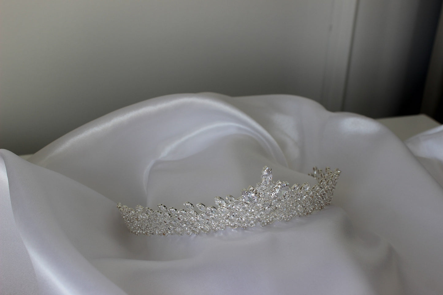 silver bridal crown on white background