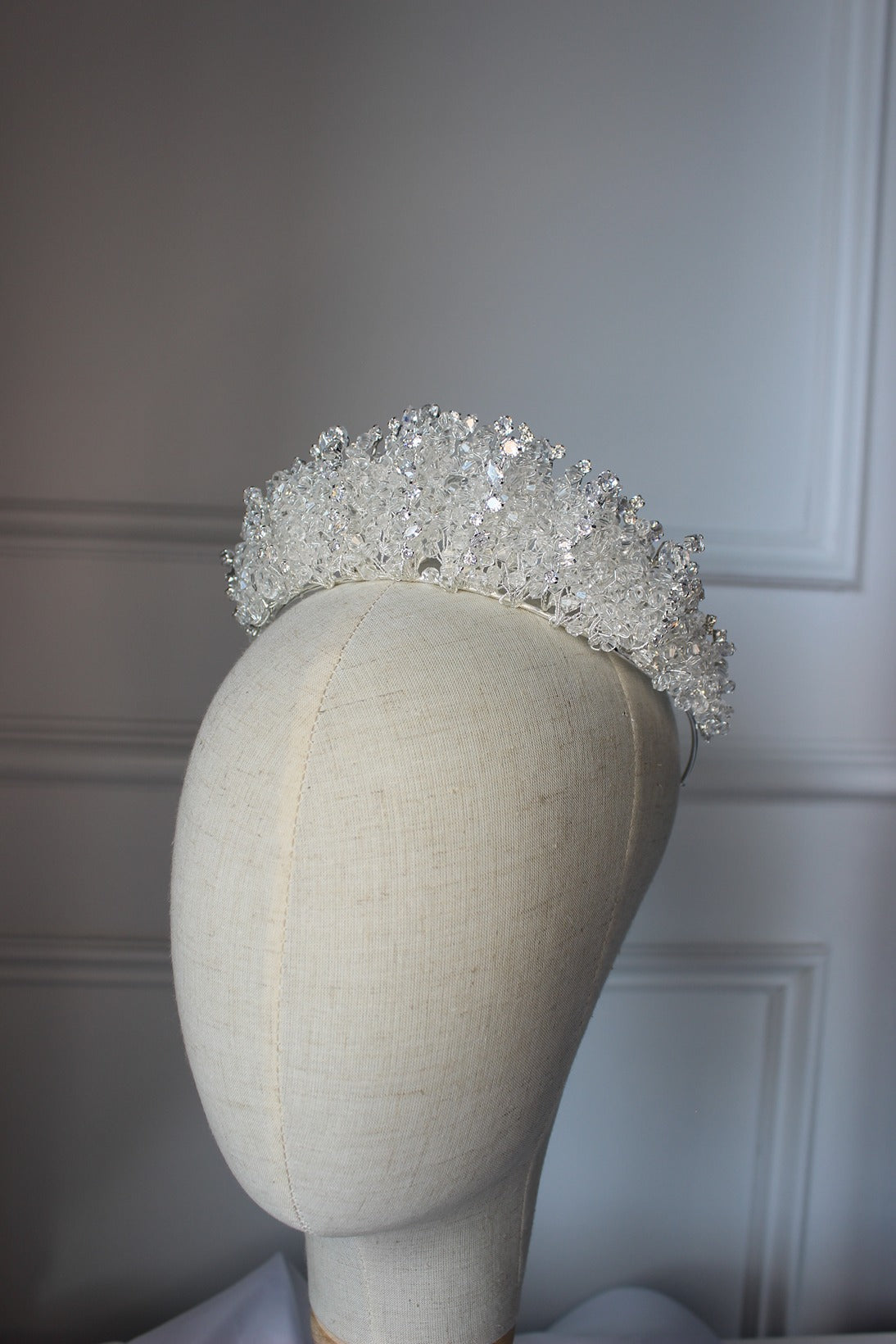 Silver bridal crown on mannequin
