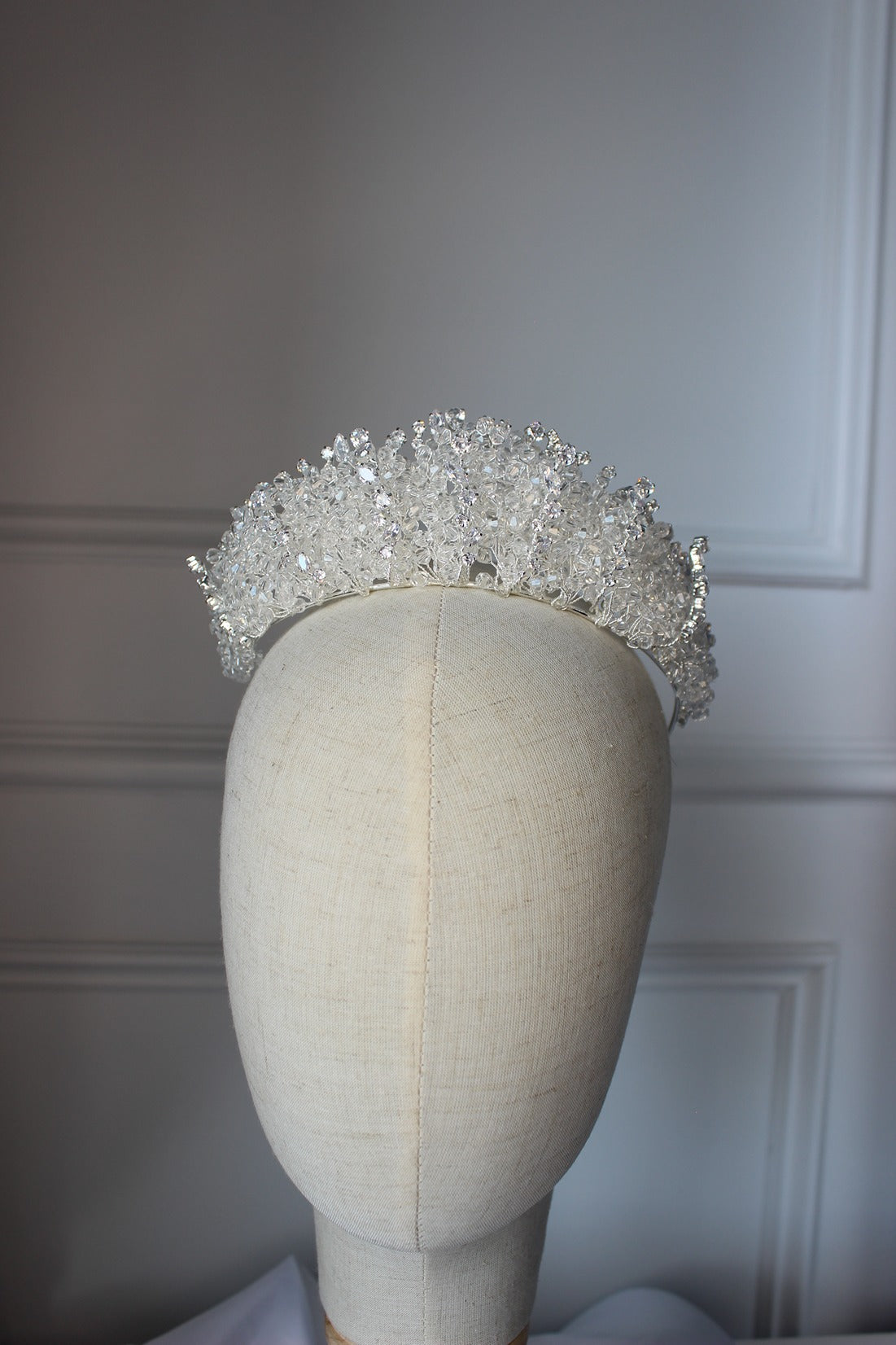 Silver bridal crown on mannequin