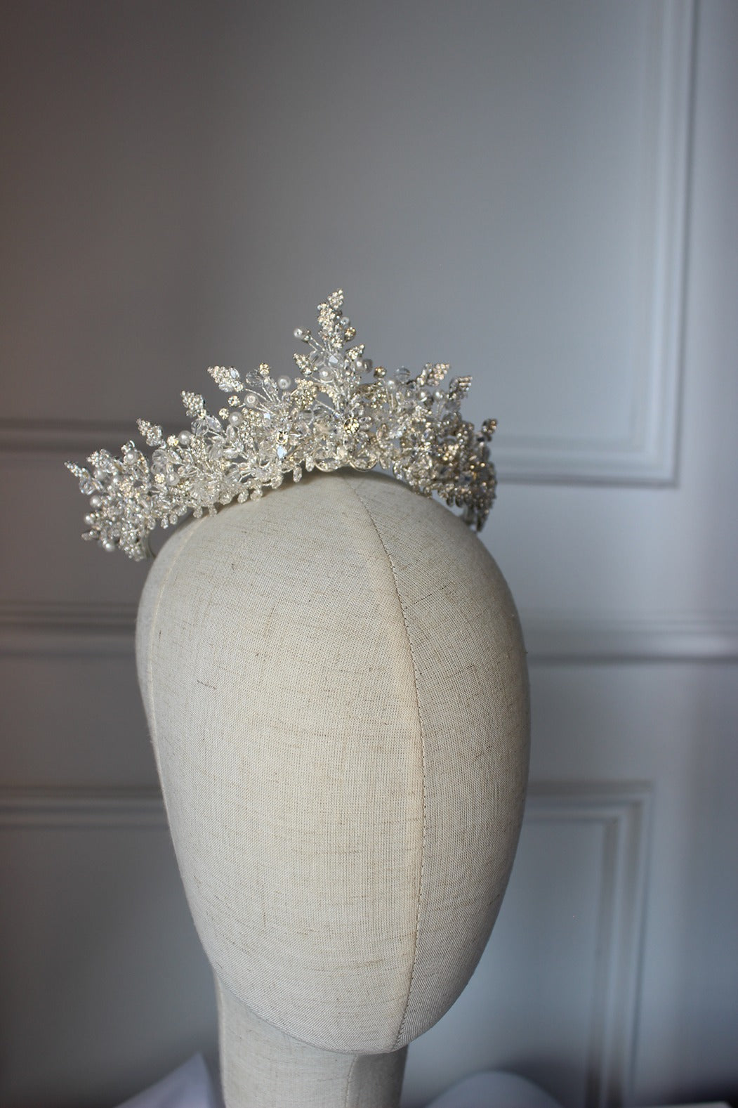 Silver bridal crown on mannequin