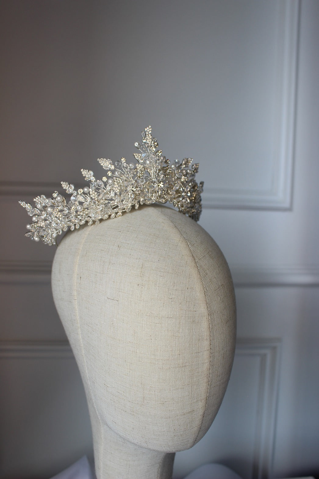 Silver bridal crown on mannequin