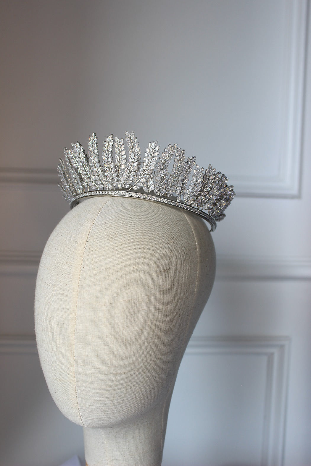 Silver bridal crown on mannequin