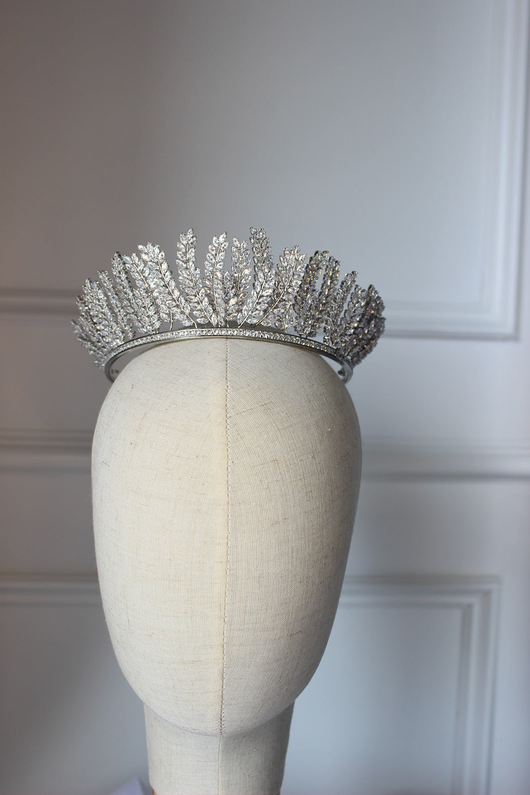 Silver bridal crown on mannequin