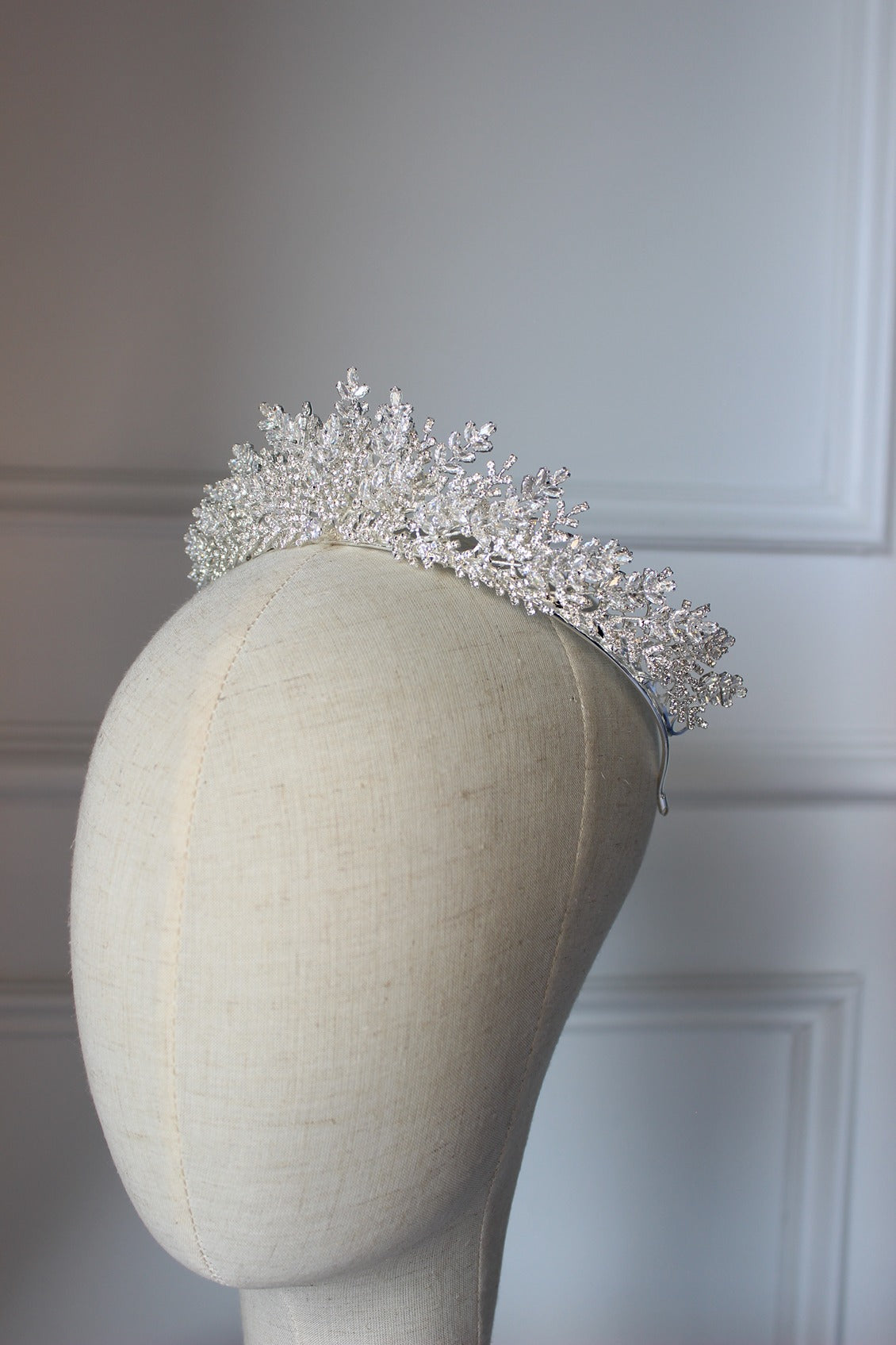Silver bridal crown on mannequin