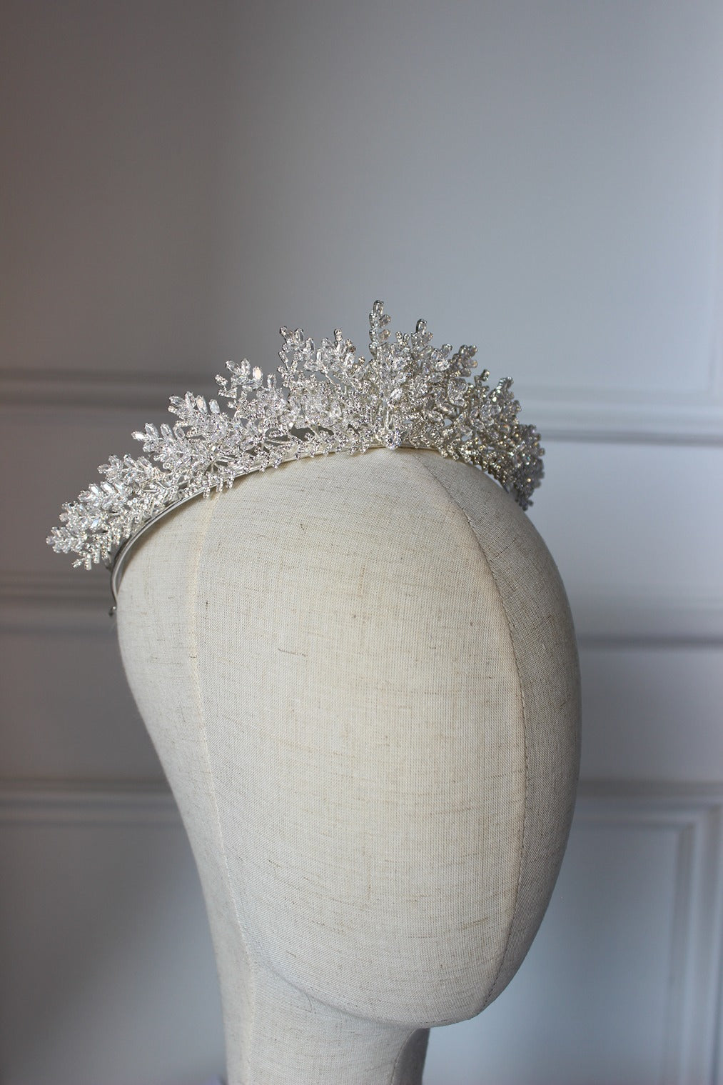 Silver bridal crown on mannequin