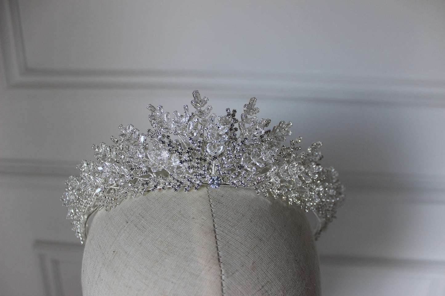 Silver bridal crown on mannequin