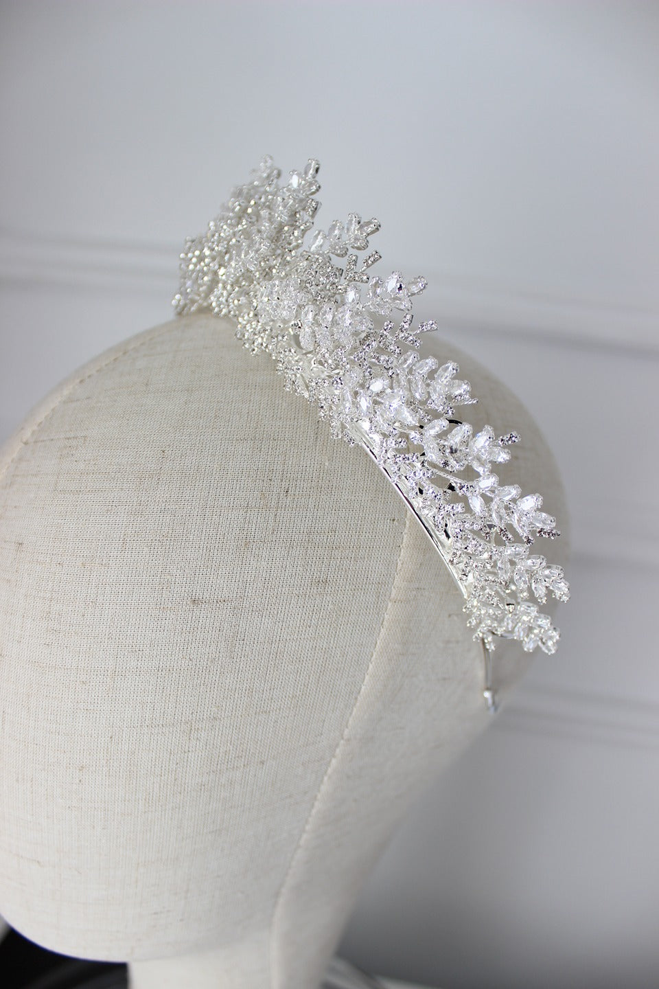 Silver bridal crown on mannequin