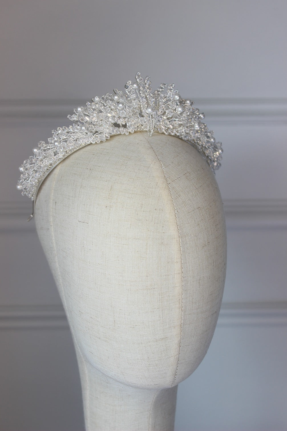 Silver bridal crown on mannequin