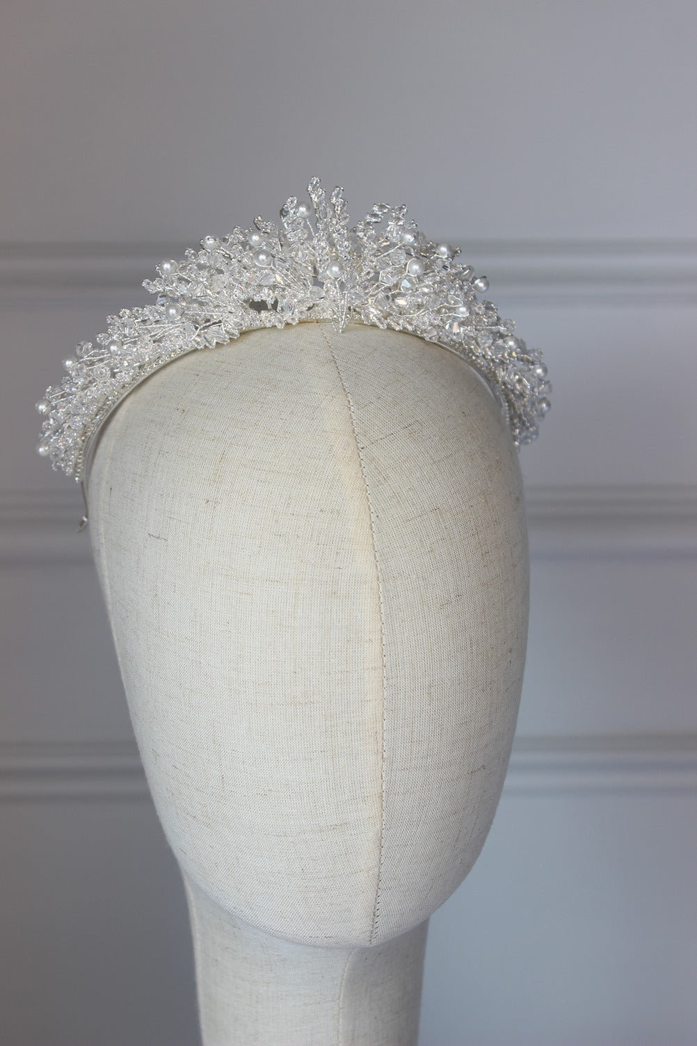 Silver bridal crown on mannequin