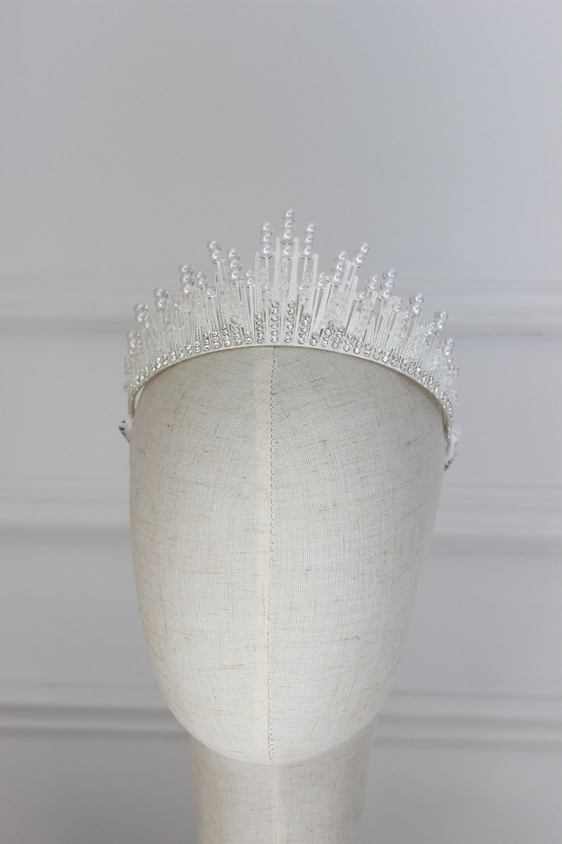 Silver bridal crown on mannequin