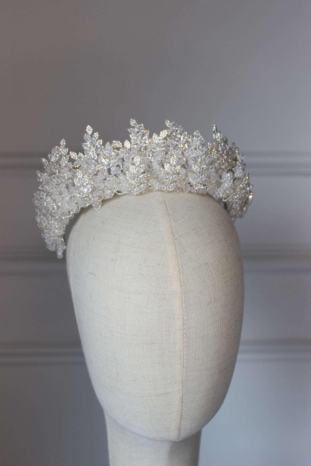 Silver bridal crown on mannequin