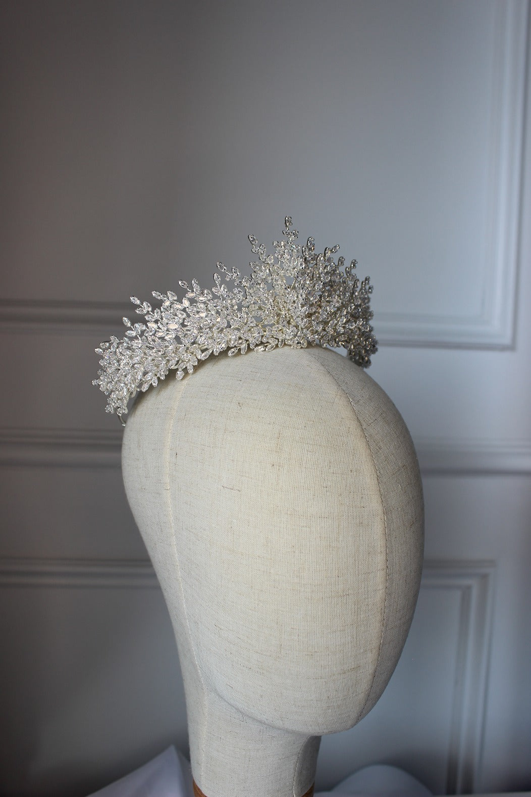 Silver bridal crown on mannequin
