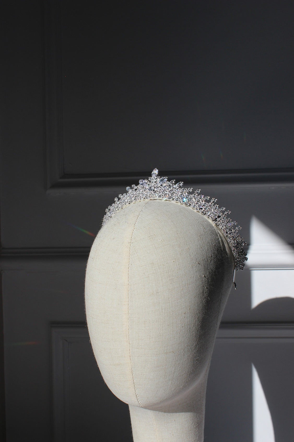 Silver bridal crown on mannequin