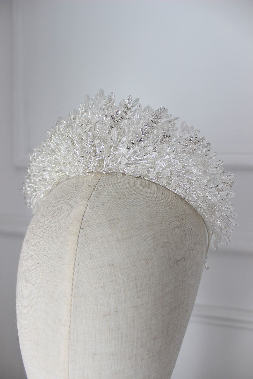 Silver bridal crown on mannequin