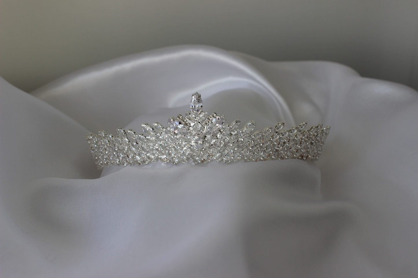 silver bridal crown on white background