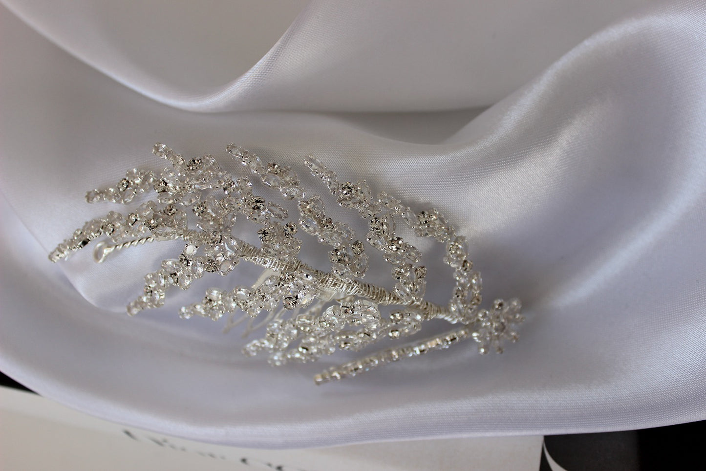 Silver bridal hair pin on white background