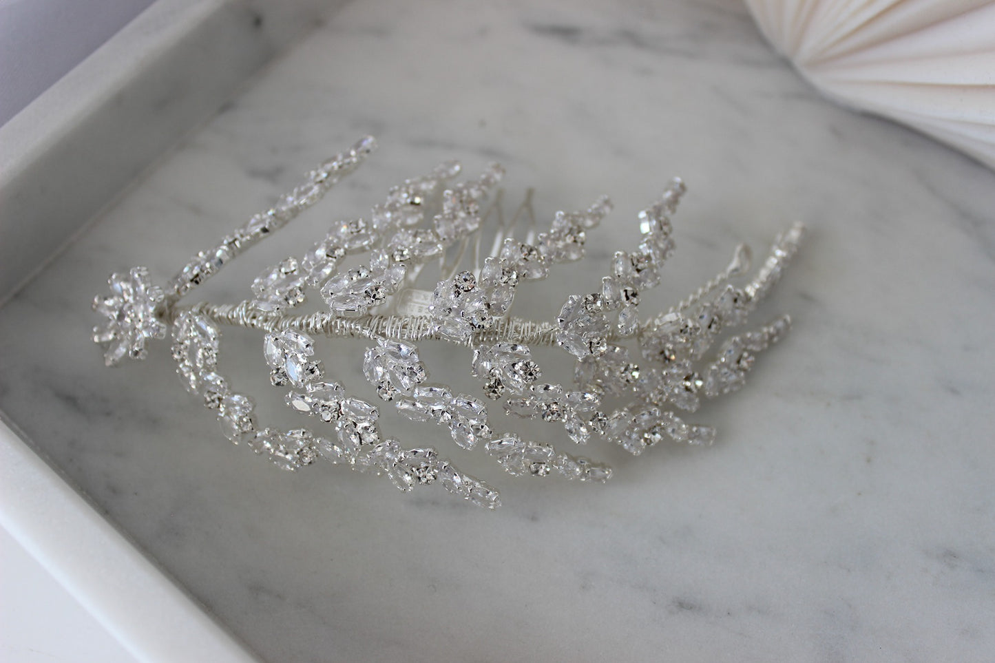 Silver bridal hair pin on white background