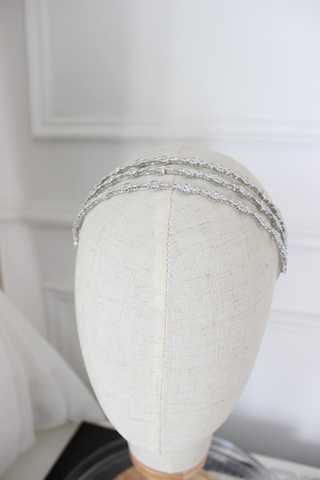 Silver bridal headband on mannequin