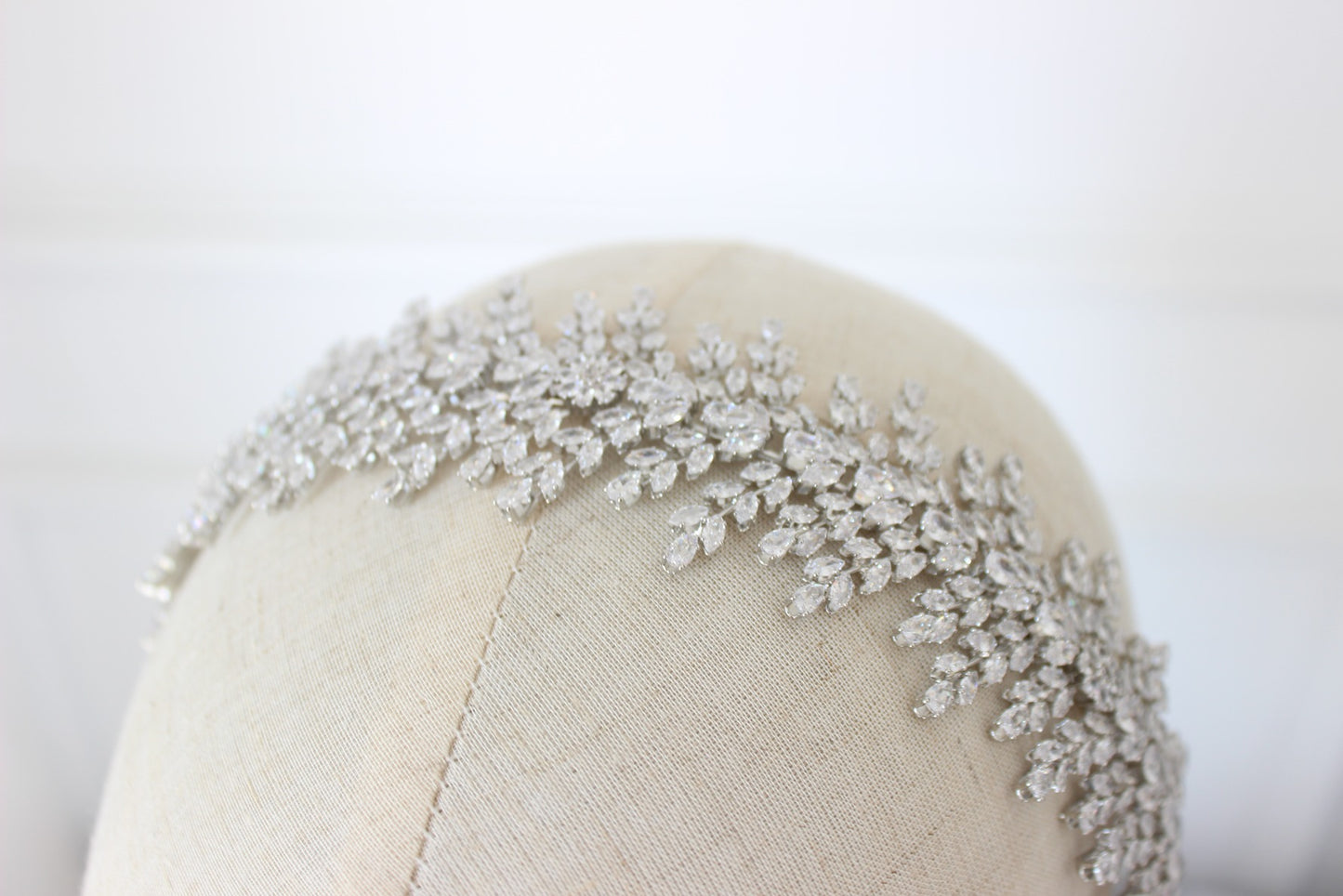 Silver bridal headband on mannequin