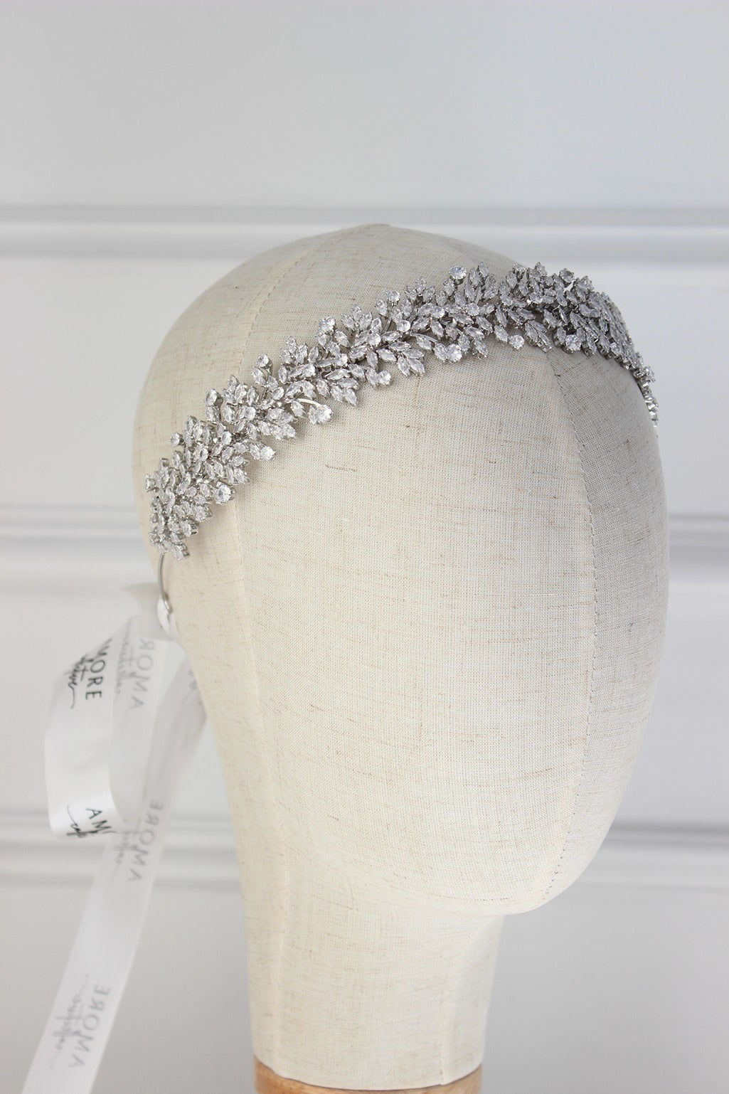 Silver bridal headband on mannequin