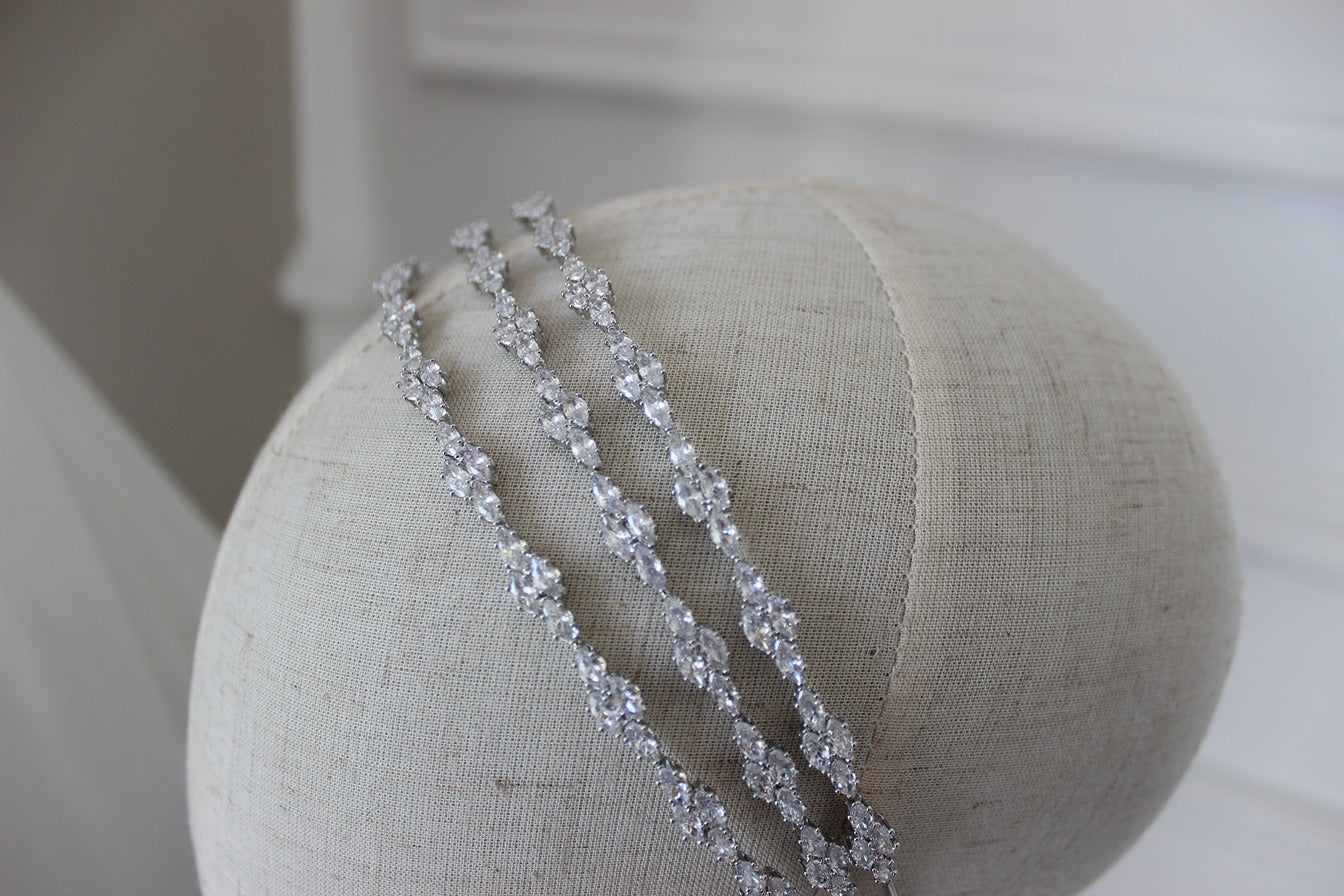 Silver bridal headband on mannequin