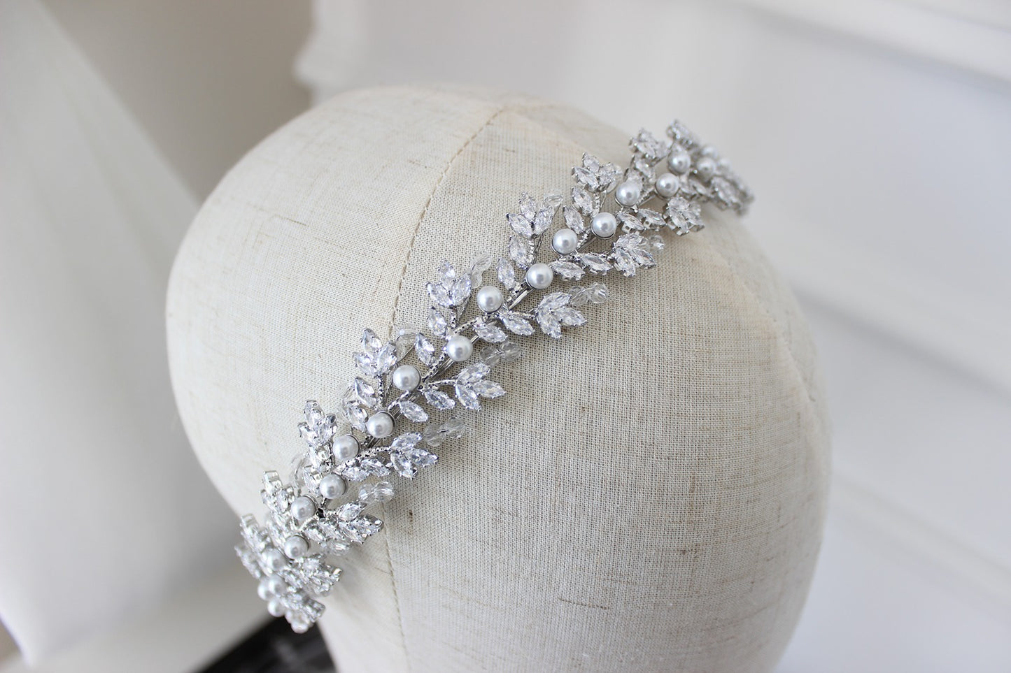 Silver bridal headband on mannequin