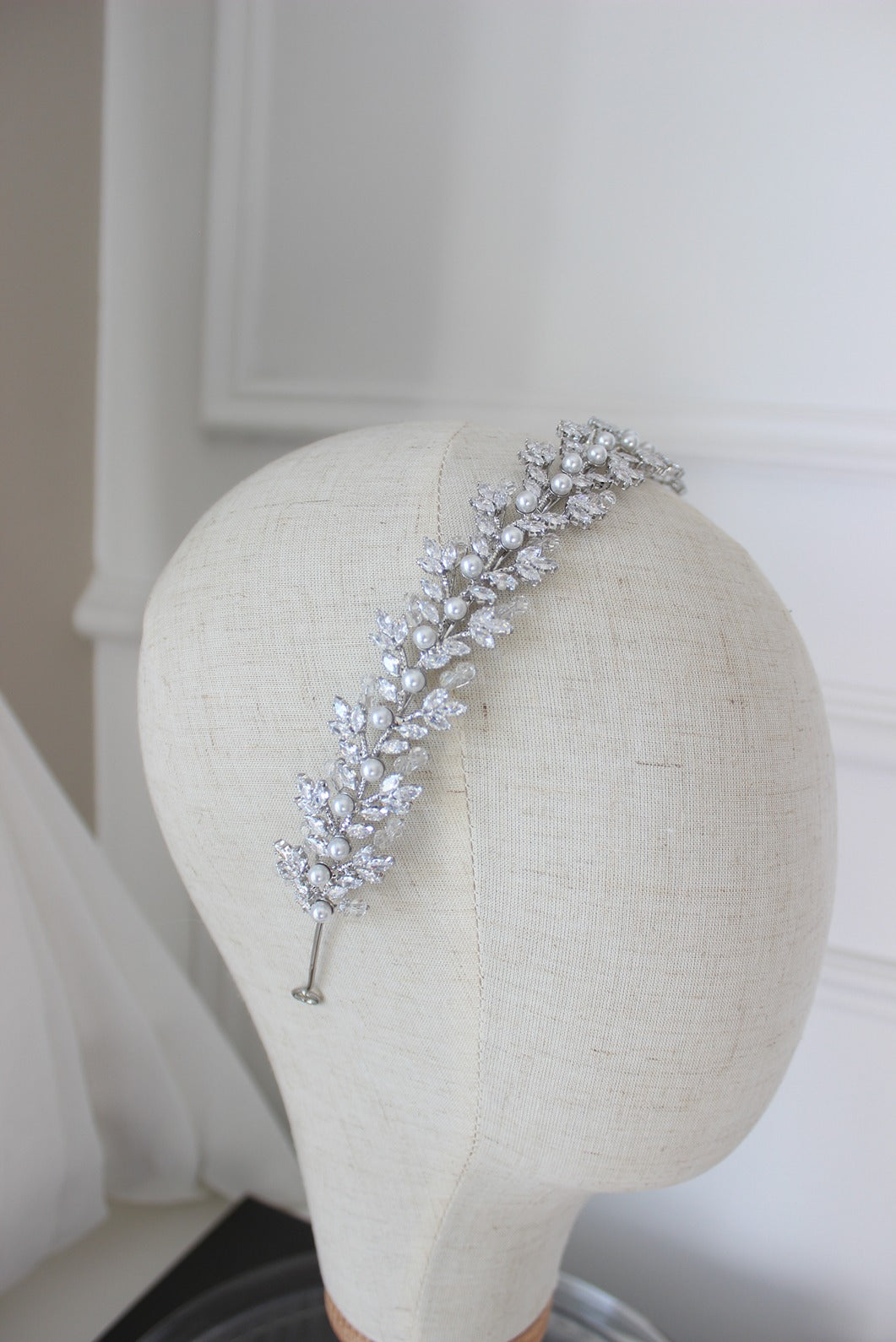 Silver bridal headband on mannequin