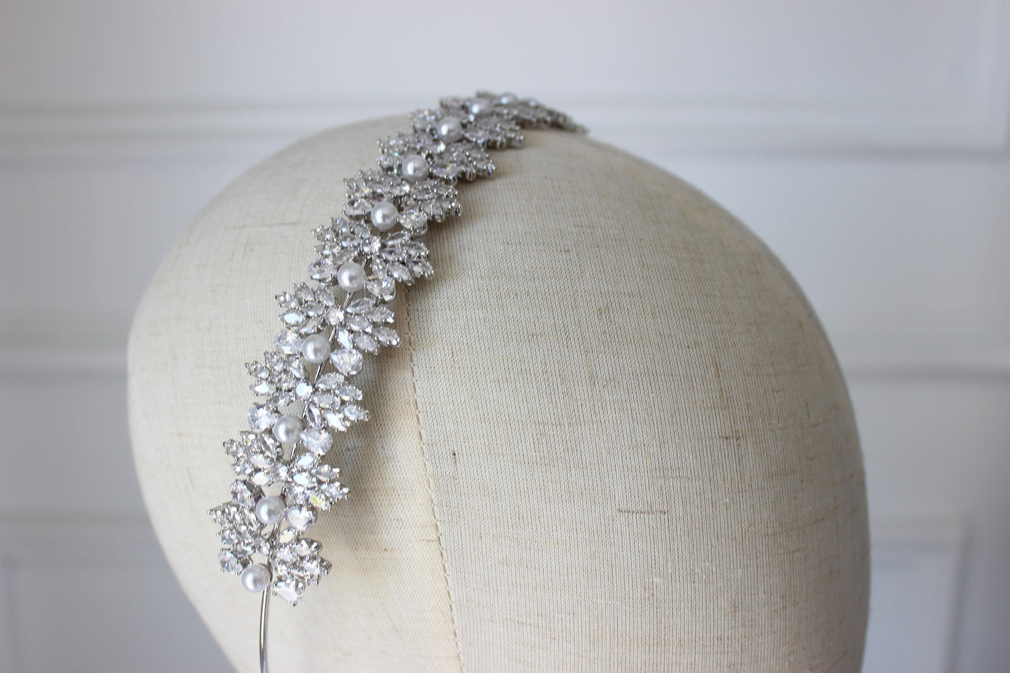 Silver bridal headband on mannequin