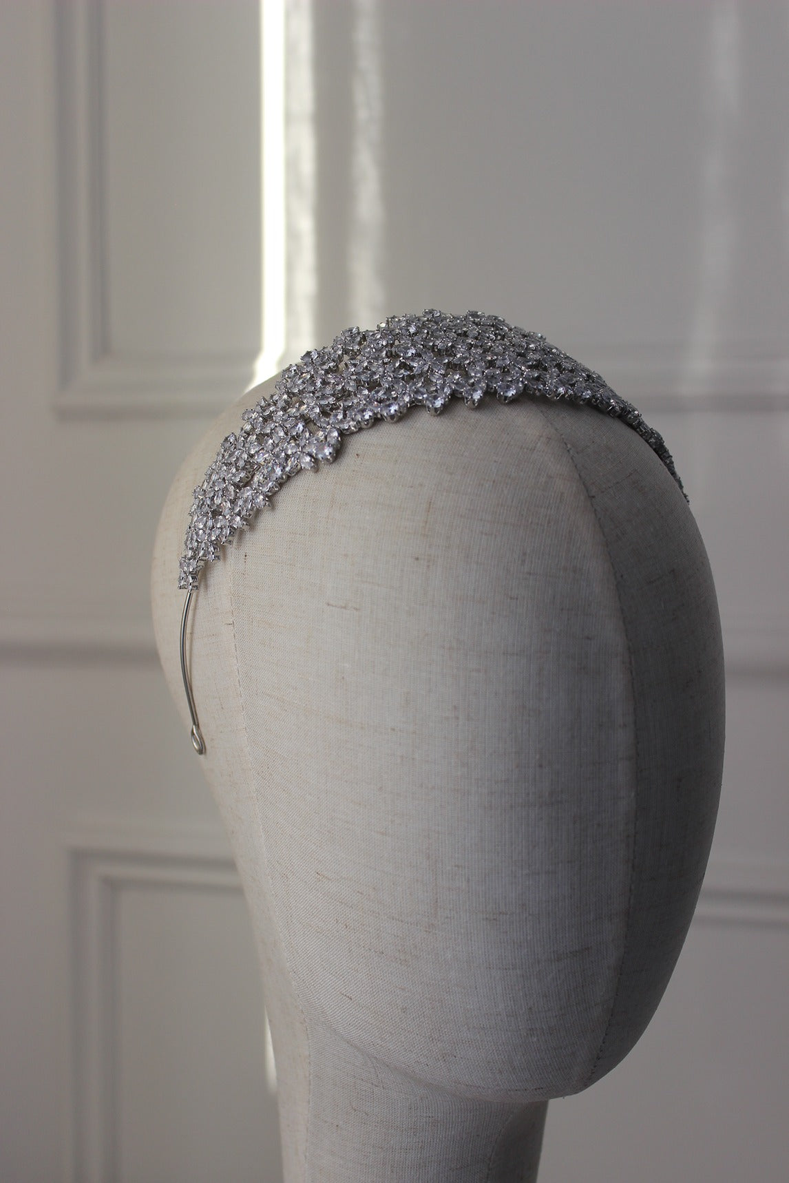 Silver bridal headband on mannequin