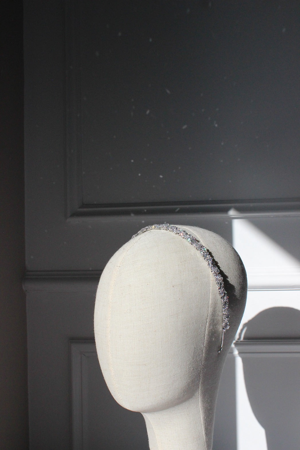 Silver bridal headband on mannequin