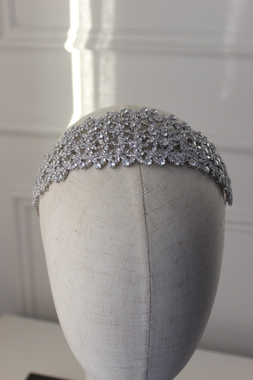 Silver bridal headband on mannequin