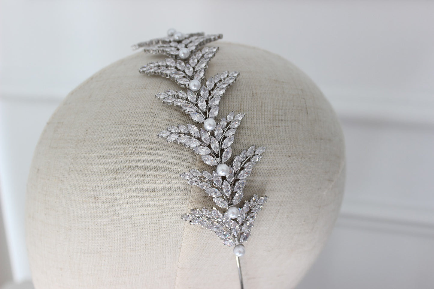 Silver bridal headband on mannequin
